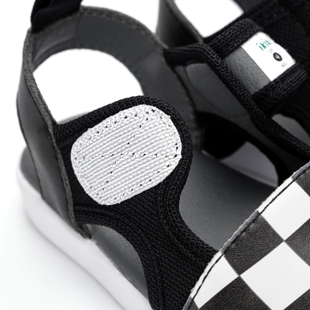 
                  
                    Checkered Squeakerless Sandal | Black/White
                  
                
